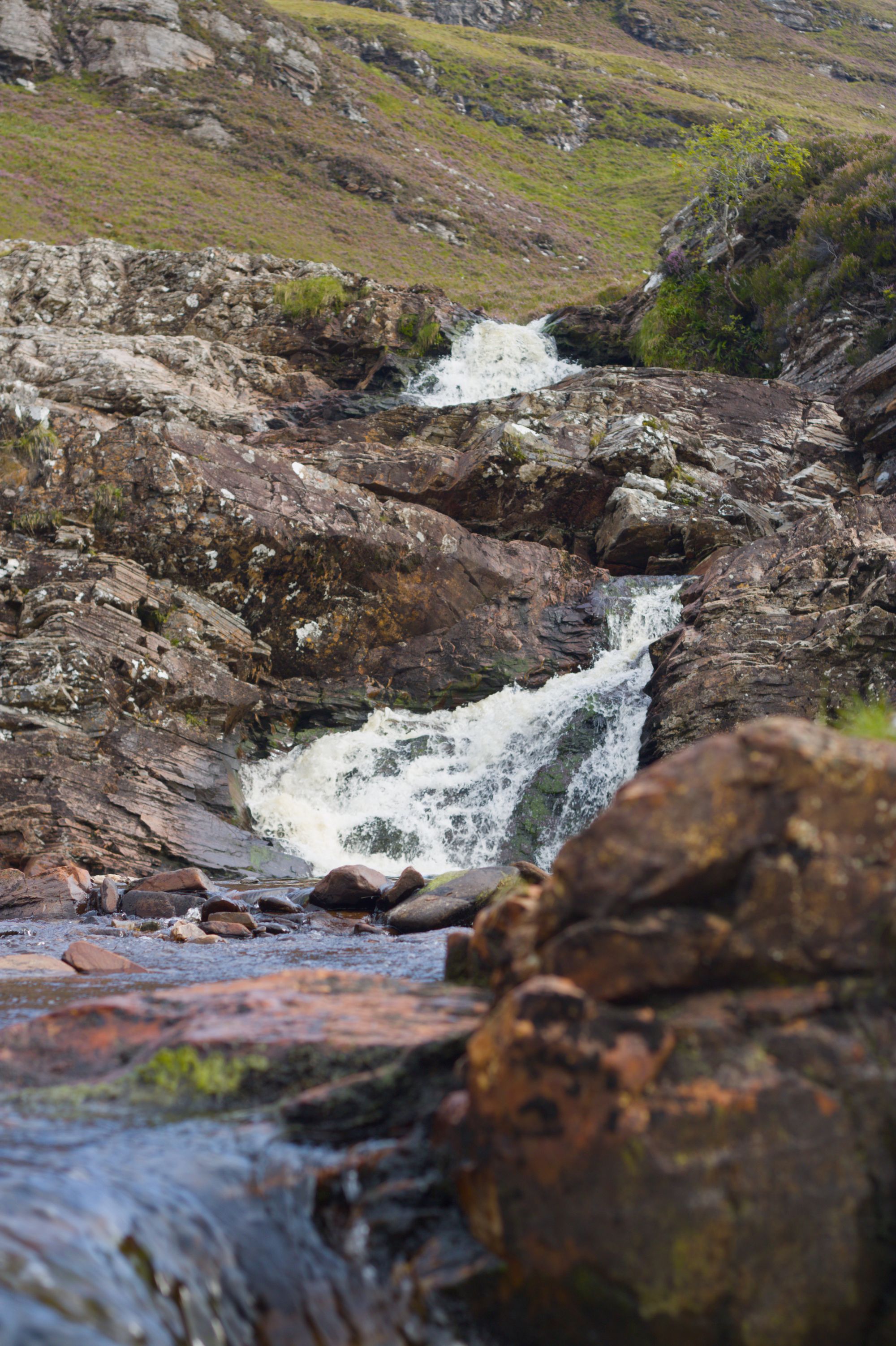 Highland peaks and mountain roads along the North Coast 500 in Scotland